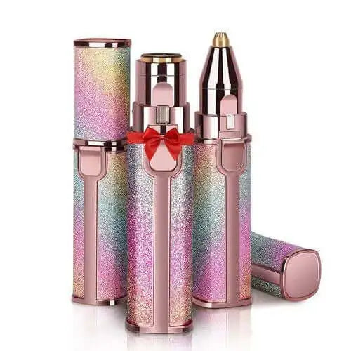 Three compact, lipstick-sized rainbow glitter eyebrow trimmers standing upright in rose gold casing, showcasing a sleek, luxury design perfect for gifting.