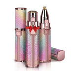 Three compact, lipstick-sized rainbow glitter eyebrow trimmers standing upright in rose gold casing, showcasing a sleek, luxury design perfect for gifting.